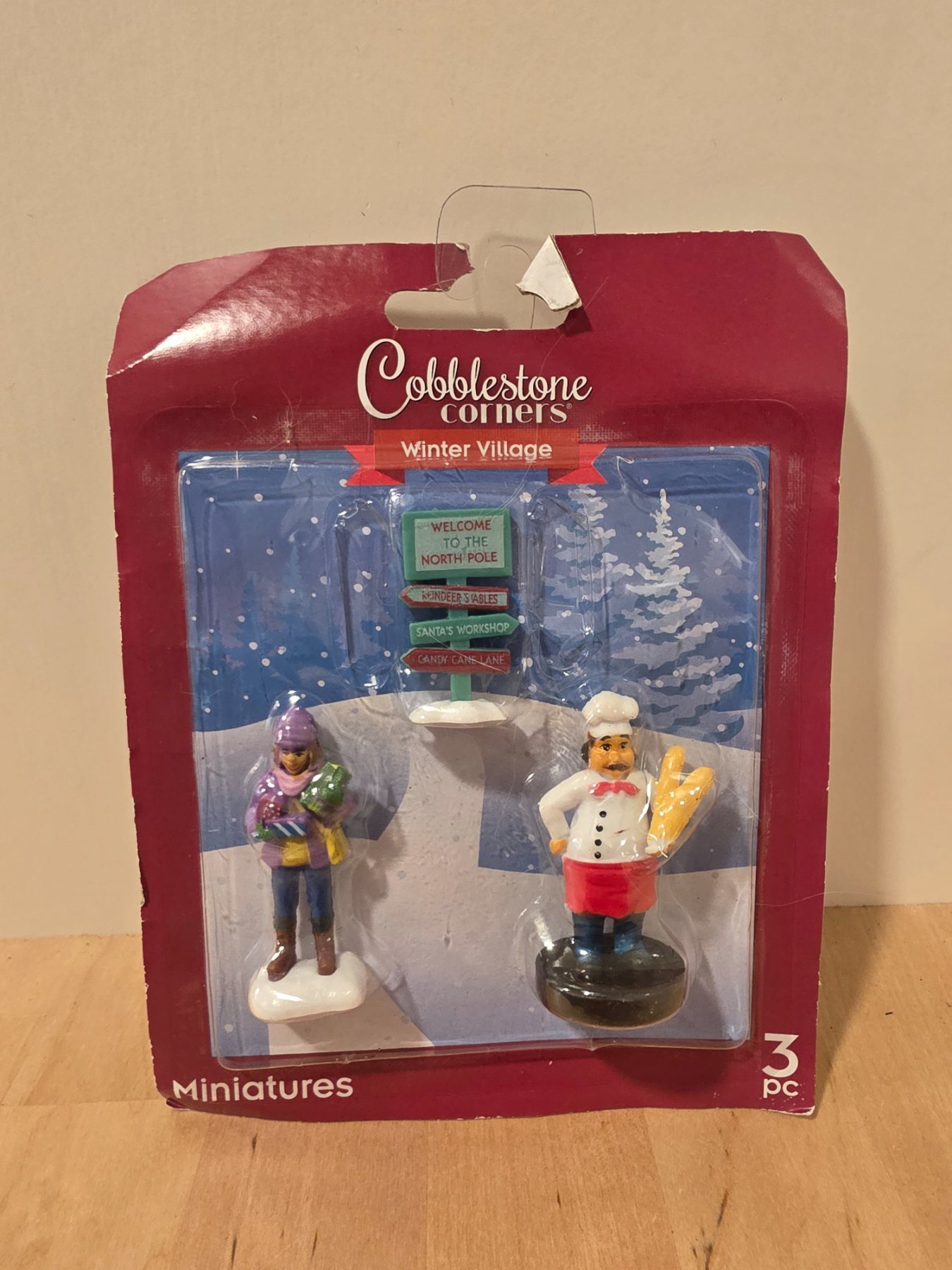 Cobblestone Corners Winter Village 3 Pc Miniatures Chef Shopper North Pole Sign