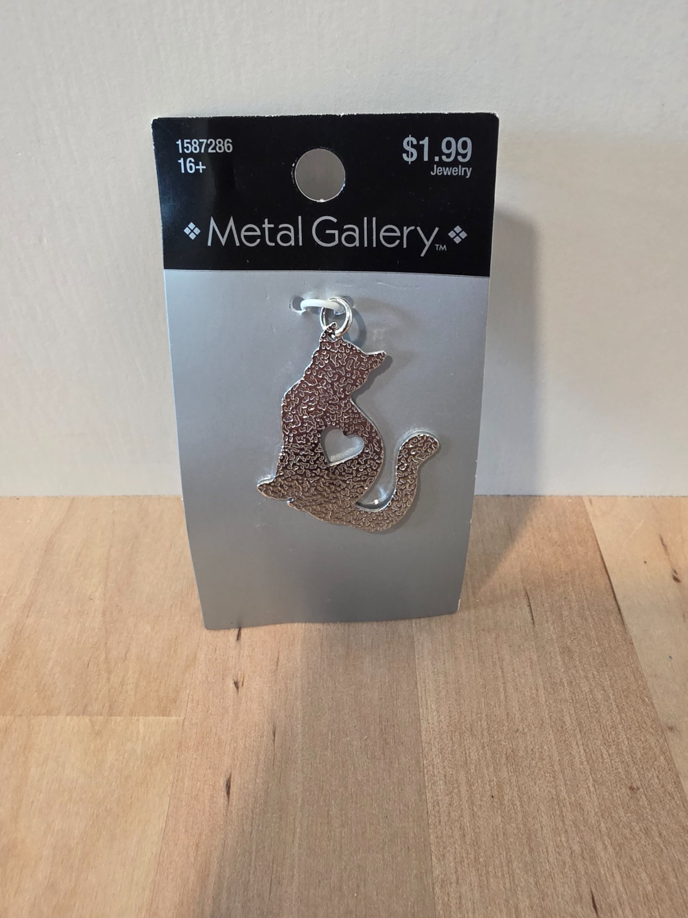 Metal Gallery Silver Tone Sitting Cat Heart Cutout Pendant 2019