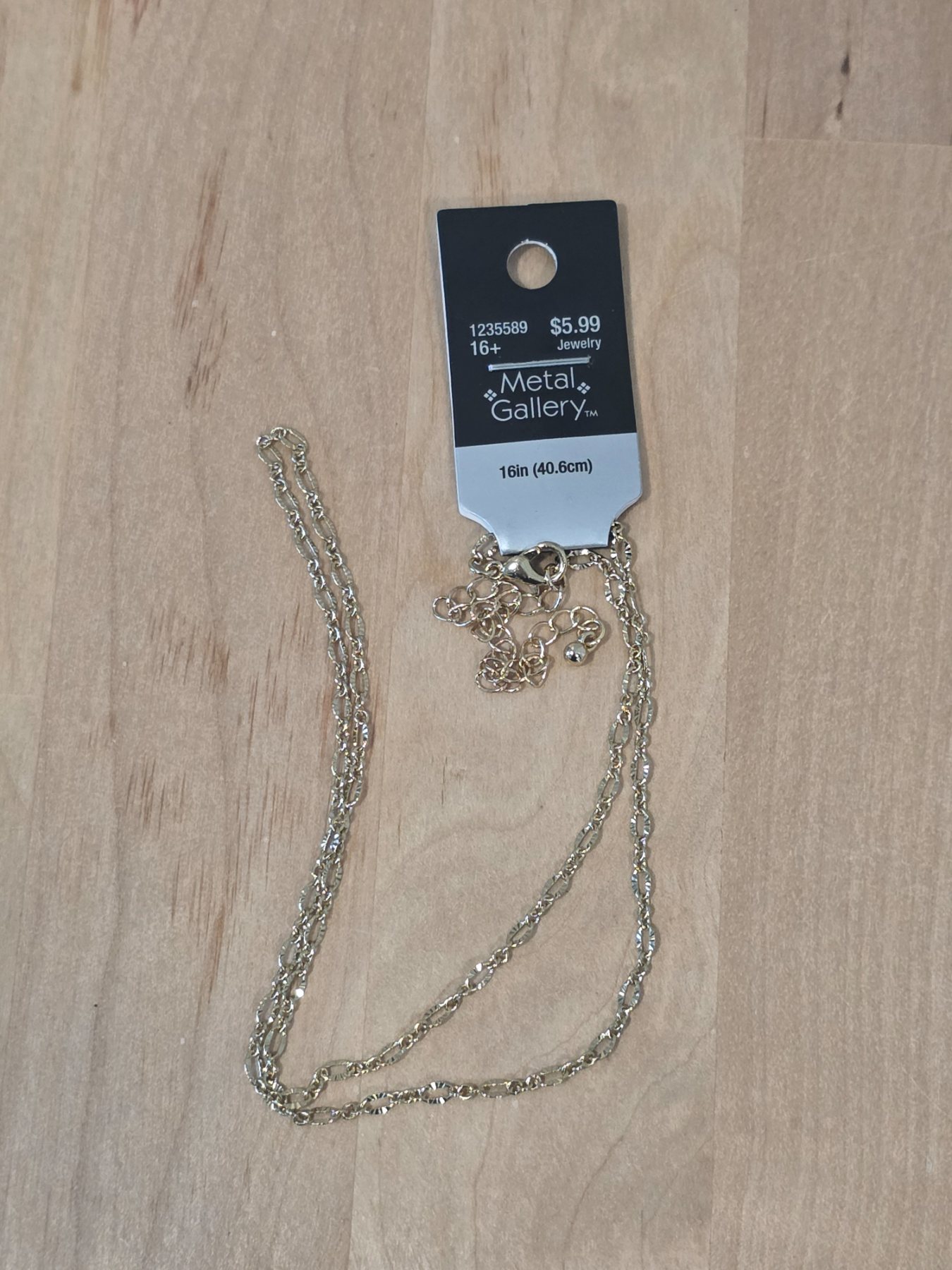 Metal Gallery 16 in Gold Tone Twisted Oval Link Chain Necklace