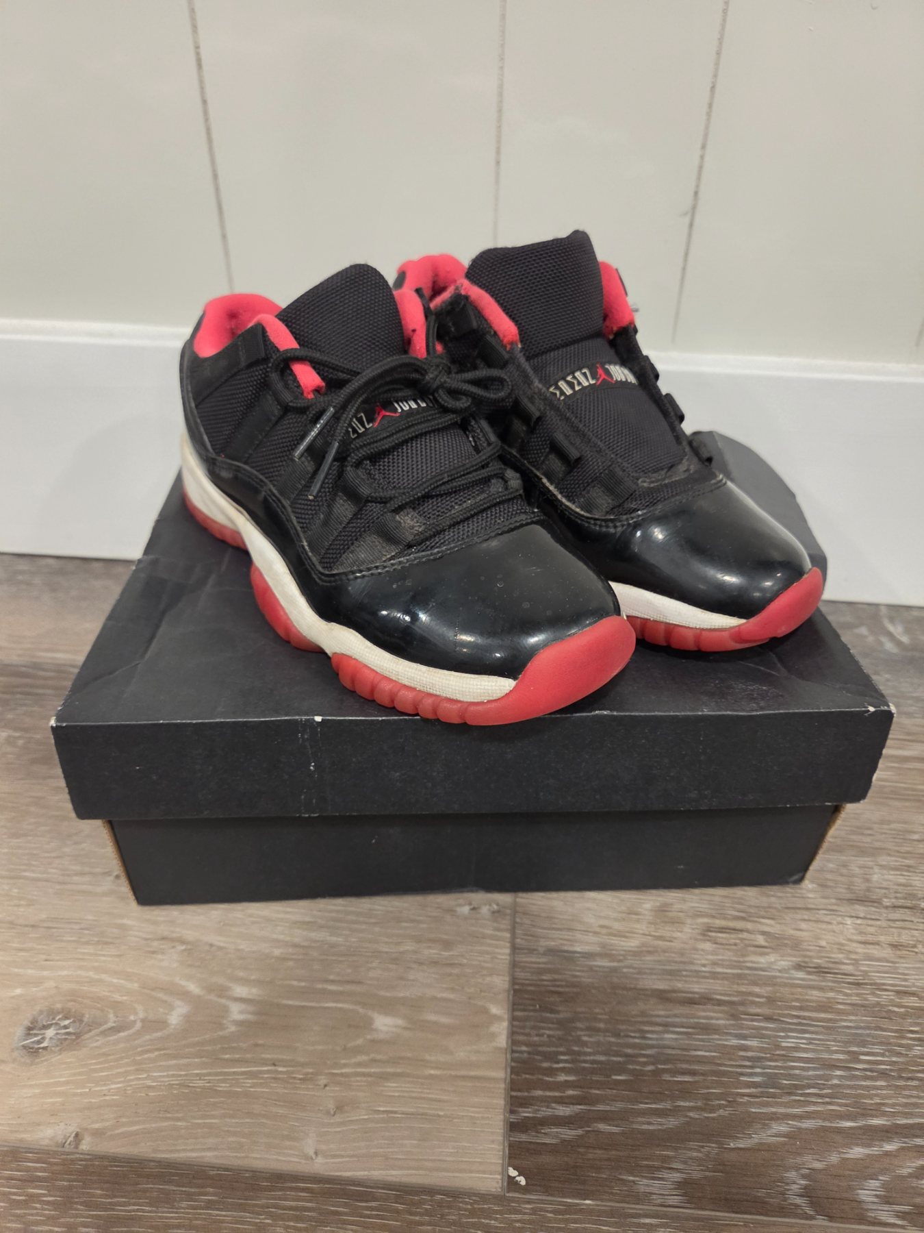 Air Jordan 11 Retro Low Bred Youth Size 4Y Black Red 528896-012