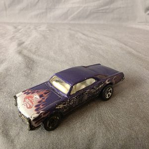 HOT WHEELS 67 PONTIAC GTO 1996 M.I.PURPLE WITH FLAMES ON HOOD MINTY CAR