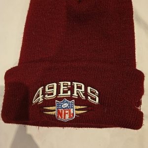Official San Francisco 49ers knit beanie by NFL Pro Line featuring a burgundy...